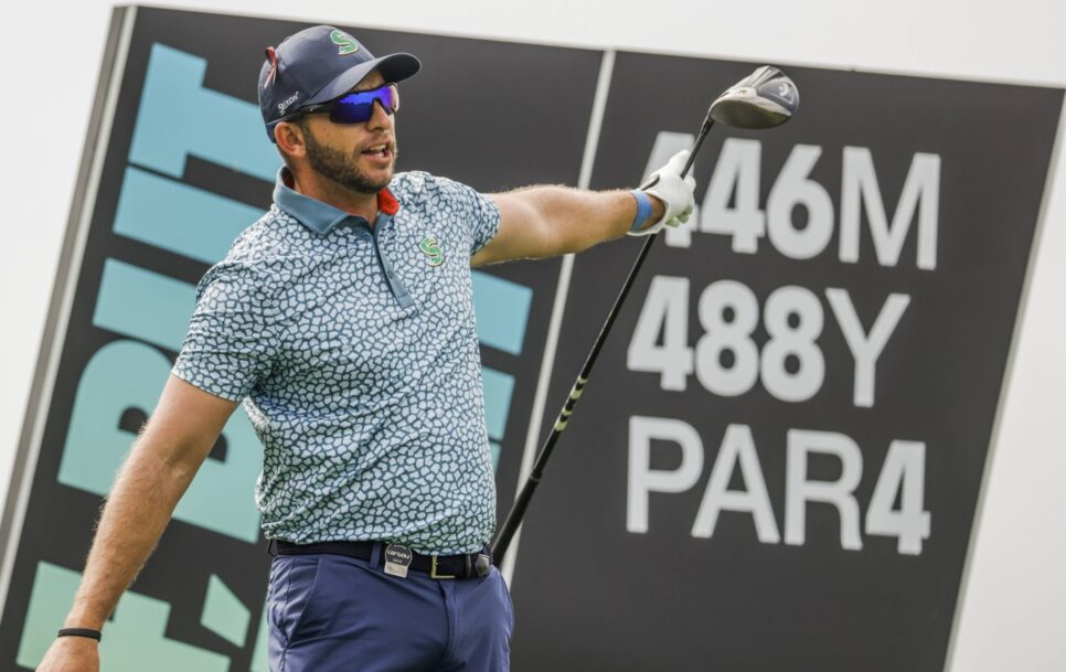 Dean Burmester of South Africa reacts to his tee shot on the sixteenth hole during the first round of the 2023 LIV Golf